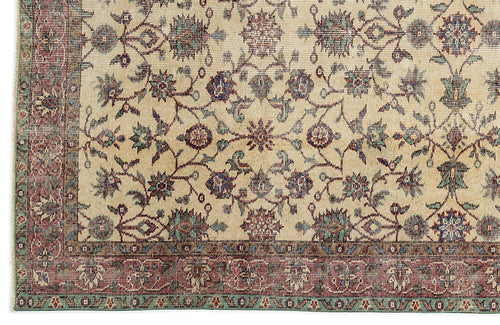 Load image 1 in gallery view. Beige traditional rug with a floral vine pattern in red, blue, and green, featuring a detailed decorative border.
