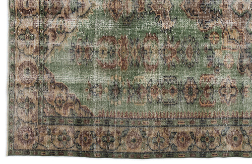 Load image 1 in gallery view. Distressed sage green rug with a faded brown and beige traditional medallion border pattern.