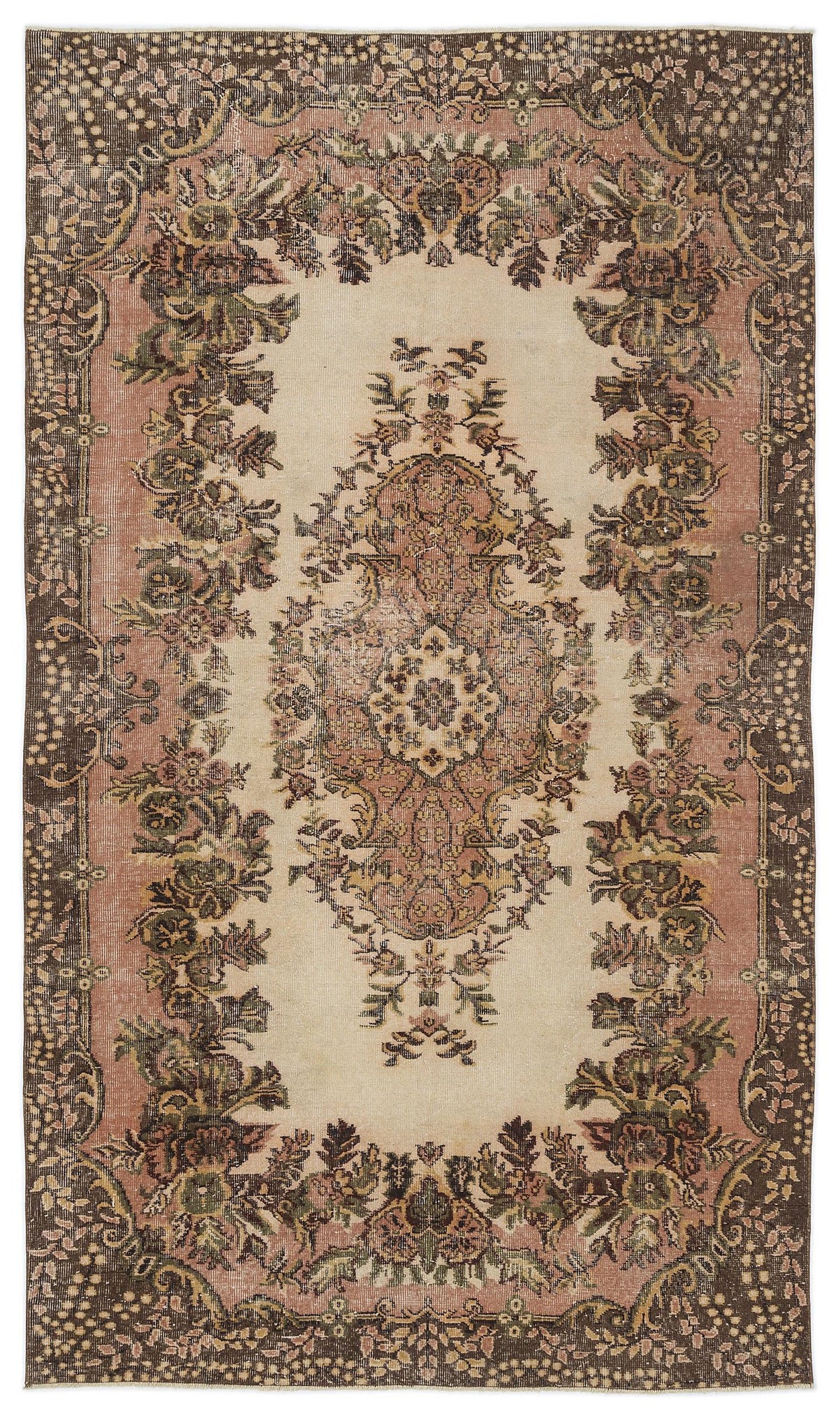 Distressed vintage-style rug with a central floral medallion and ornate border in muted brown, pink, and cream tones.