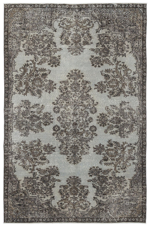 Load image 1 in gallery view. Distressed light blue and charcoal grey rug with a traditional central medallion and floral border pattern.
