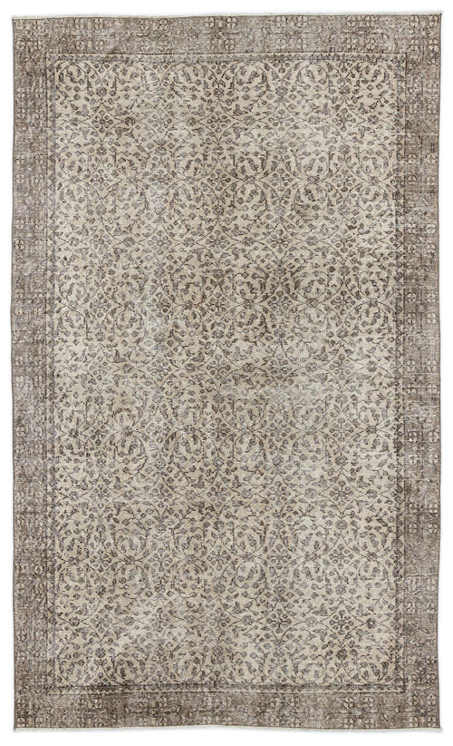 Load image 1 in gallery view. Taupe and cream distressed rug with an intricate traditional floral pattern and a wide decorative border.