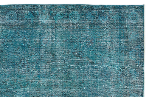 Load image 1 in gallery view. Teal and black distressed rug with a fine horizontal linear texture and faded vintage-style pattern.