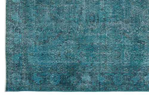 Load image 1 in gallery view. Teal and dark blue distressed rug with a faded traditional medallion pattern.