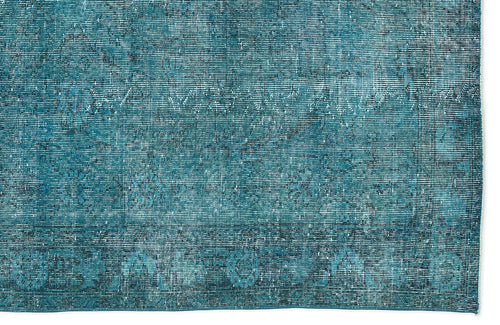 Load image 1 in gallery view. Teal and dark blue distressed rug with a faded traditional medallion pattern on a white background.