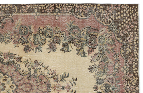 Load image 1 in gallery view. Beige, brown, and muted red traditional rug with a floral medallion pattern and a detailed geometric border.