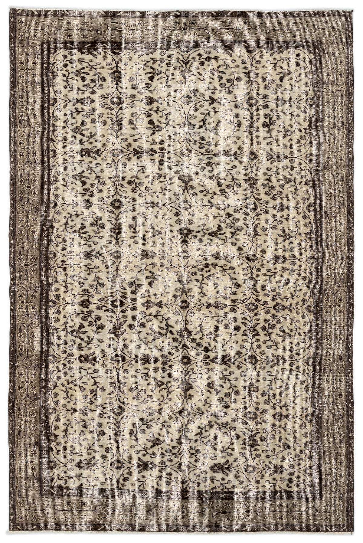 Dark brown and beige vintage-style rug with a repeating floral vine pattern and a wide decorative border.