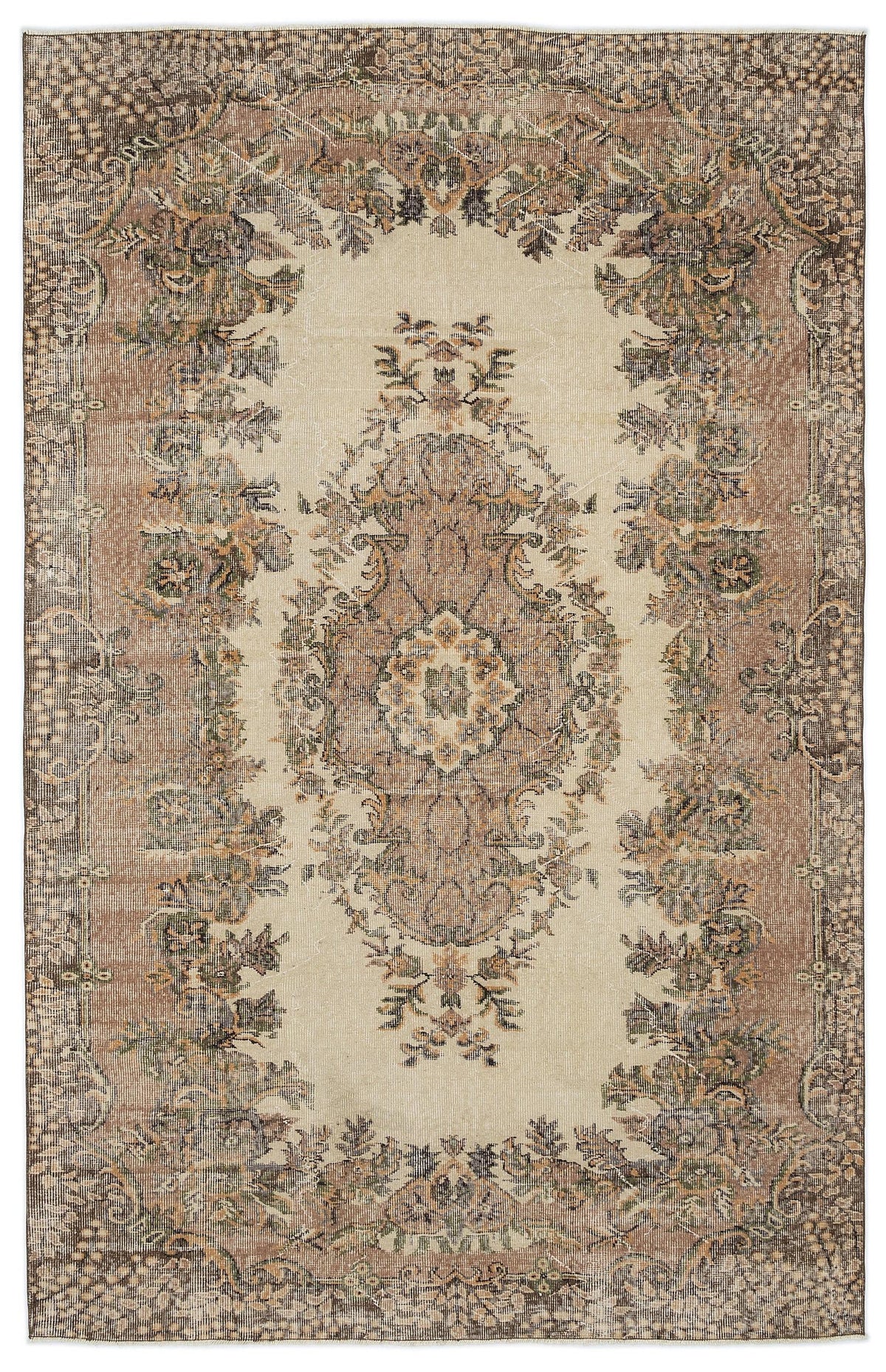 Distressed beige rug with a brown and sage green central floral medallion and ornate border.