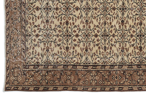 Load image 1 in gallery view. Beige and brown traditional rug with a dense floral medallion pattern and a wide, ornate border.