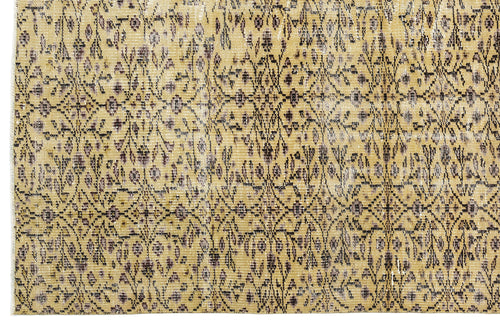 Load image 1 in gallery view. Mustard yellow and charcoal grey rug with a distressed, repeating floral medallion pattern.