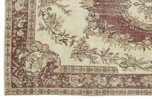 Load image 1 in gallery view. Distressed cream and terracotta rug with a floral medallion pattern and a decorative border.