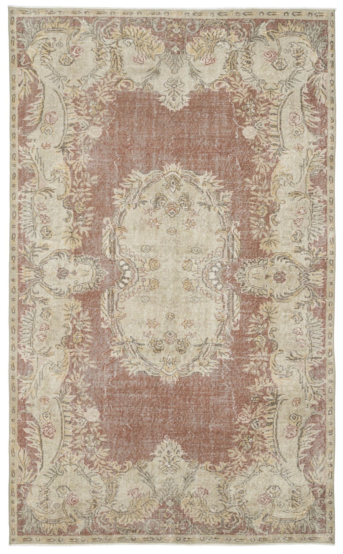 Distressed terracotta and beige traditional rug with a central floral medallion and ornate border.