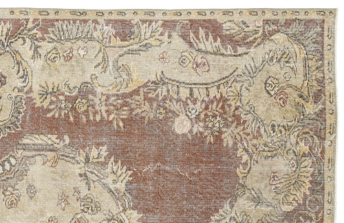 Load image 1 in gallery view. Rust and cream traditional rug with a distressed floral medallion pattern.
