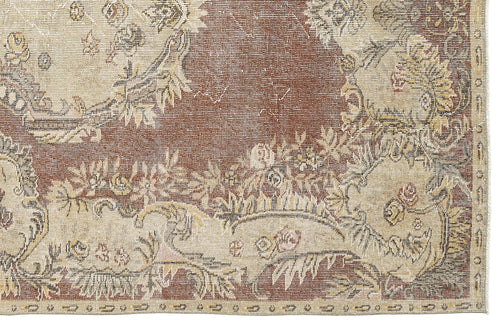 Load image 1 in gallery view. Rust and beige traditional rug with a distressed floral medallion pattern and a detailed border.