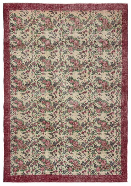 Load image 1 in gallery view. Beige rug with a red border and a repeating floral pattern in shades of red, green, and dark purple.