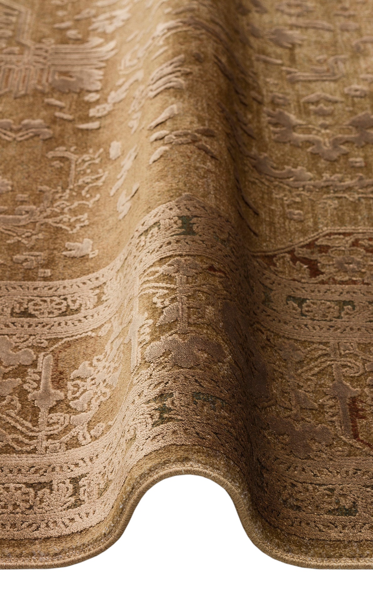 Tan and brown traditional rug with a raised, tone-on-tone floral medallion pattern and a folded edge.