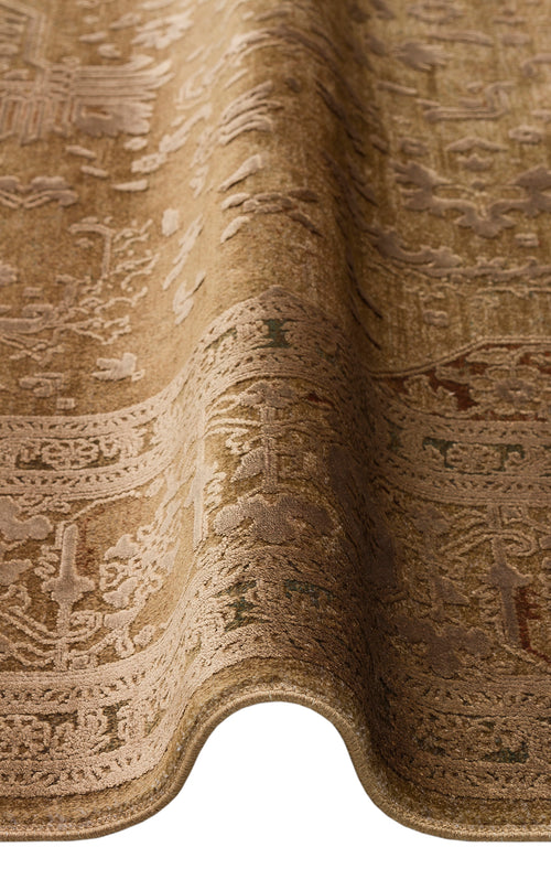 Load image 1 in gallery view. Tan and brown traditional rug with a raised, tone-on-tone floral medallion pattern and a folded edge.