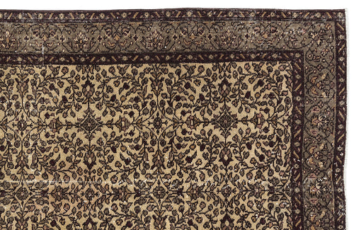 Load image 1 in gallery view. Brown and beige traditional rug with a dense, intricate floral vine pattern and a wide, dark decorative border.
