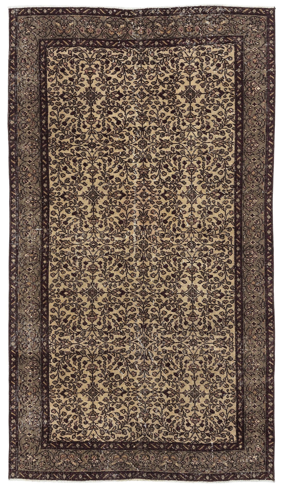 Dark brown and beige vintage-style rug with an all-over floral vine pattern and a wide decorative border.