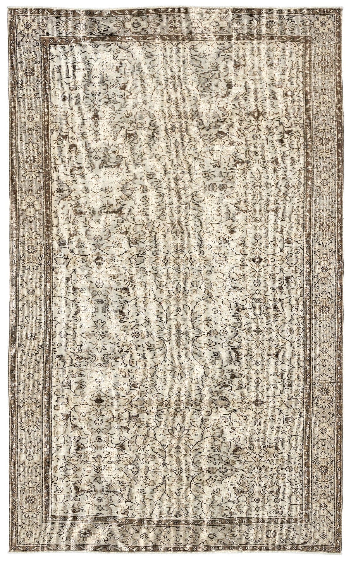 Beige and brown traditional rug with an intricate floral vine pattern and a decorative border.