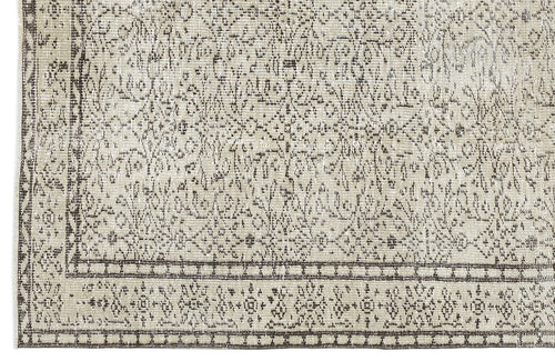 Load image 1 in gallery view. Beige and charcoal grey rug with a distressed traditional medallion pattern and a geometric border.