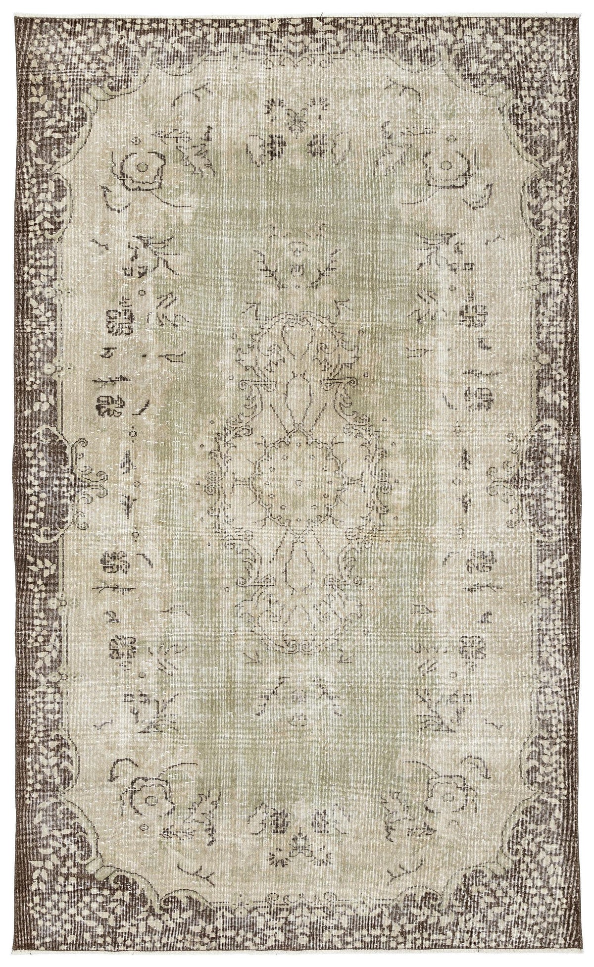 Sage green and brown distressed vintage-style rug with a central floral medallion and ornate border.