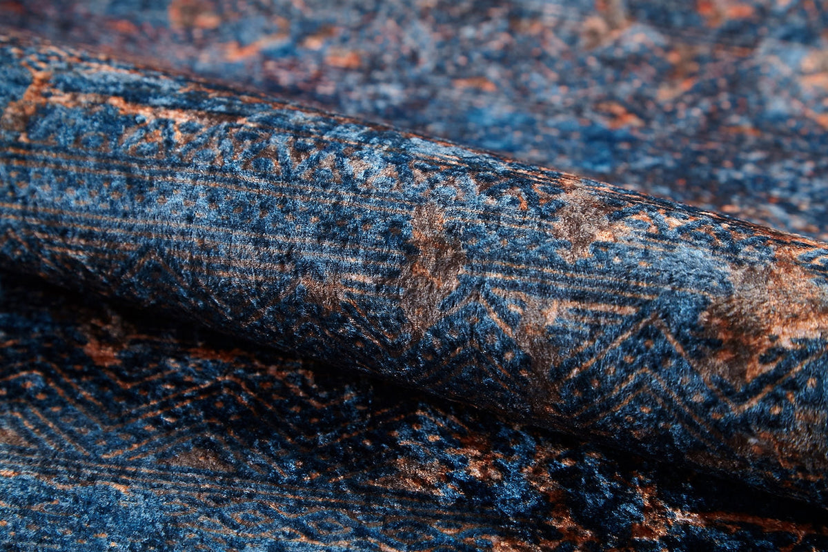 Close-up of the Abstract Harmony - Machine-Washable Rug JR1882 in blue, showcasing its intricate blue and brown geometric and abstract patterns—textured, rich, and perfect for high-traffic areas; available in custom sizes.