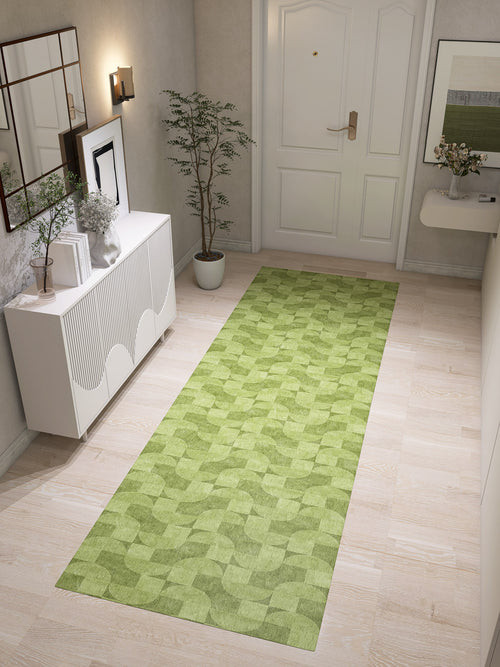 Load image 1 in gallery view. A modern hallway with light wood floors, white walls, and the Aged Serenity - Washable Rug - JRN51 featuring a geometric pattern; paired with a white console table, decor accents, potted plant, wall art, and a closed white door—ideal for contemporary interiors.
