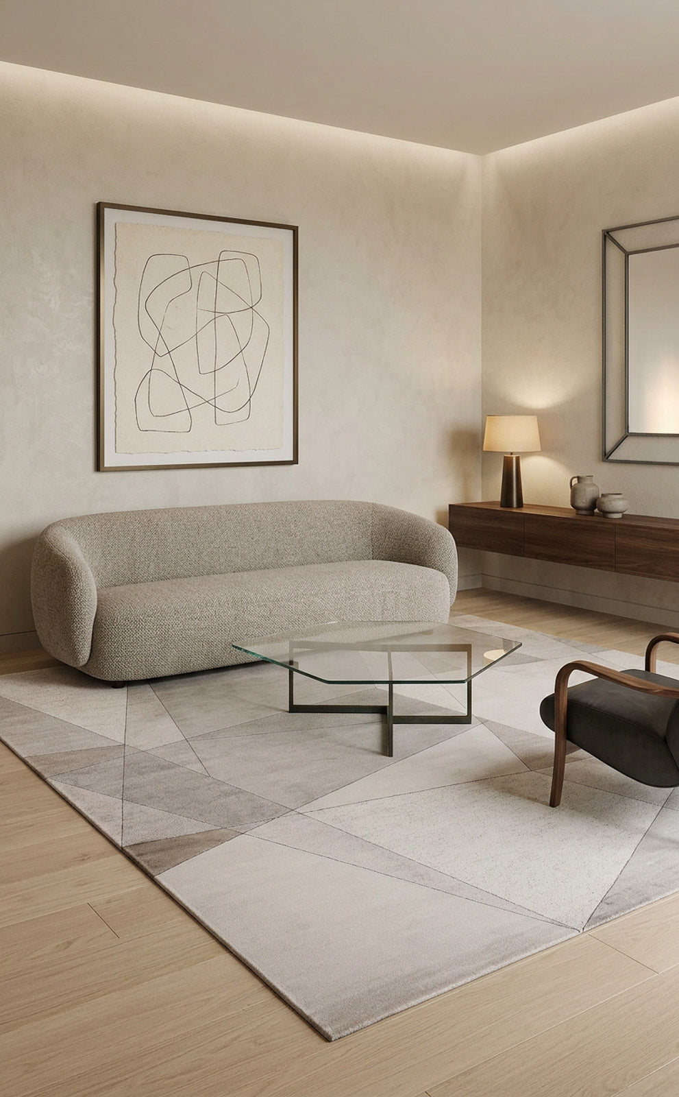 Grey and beige rug with a geometric line pattern, styled in a modern living room with a curved sofa.