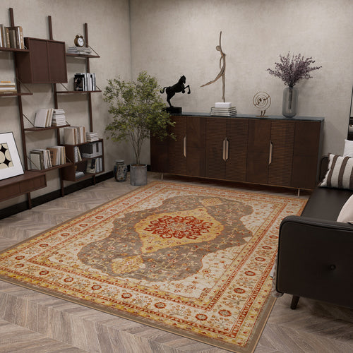 Bild 1 in Galerieansicht laden. A modern living room showcases the Amber Stone - Washable Rug - JRS026 with geometric patterns, paired with wooden furniture, a sofa, bookshelves, a plant, and decorative sculptures on a sideboard—ideal for contemporary spaces.