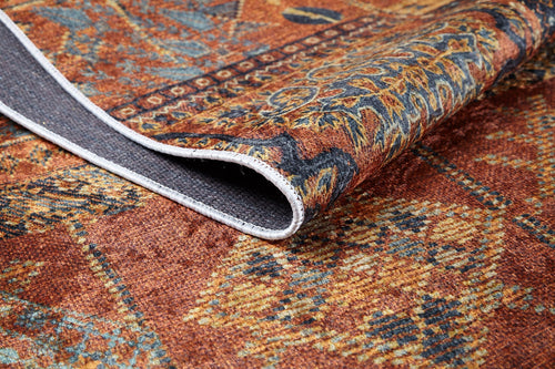 Load image 1 in gallery view. A close-up of the Ancient Palace - Washable Rug - JR1864 (Custom Size) in orange, showing its multicolored pattern and textured gray underside—an ideal choice for high-traffic spaces.