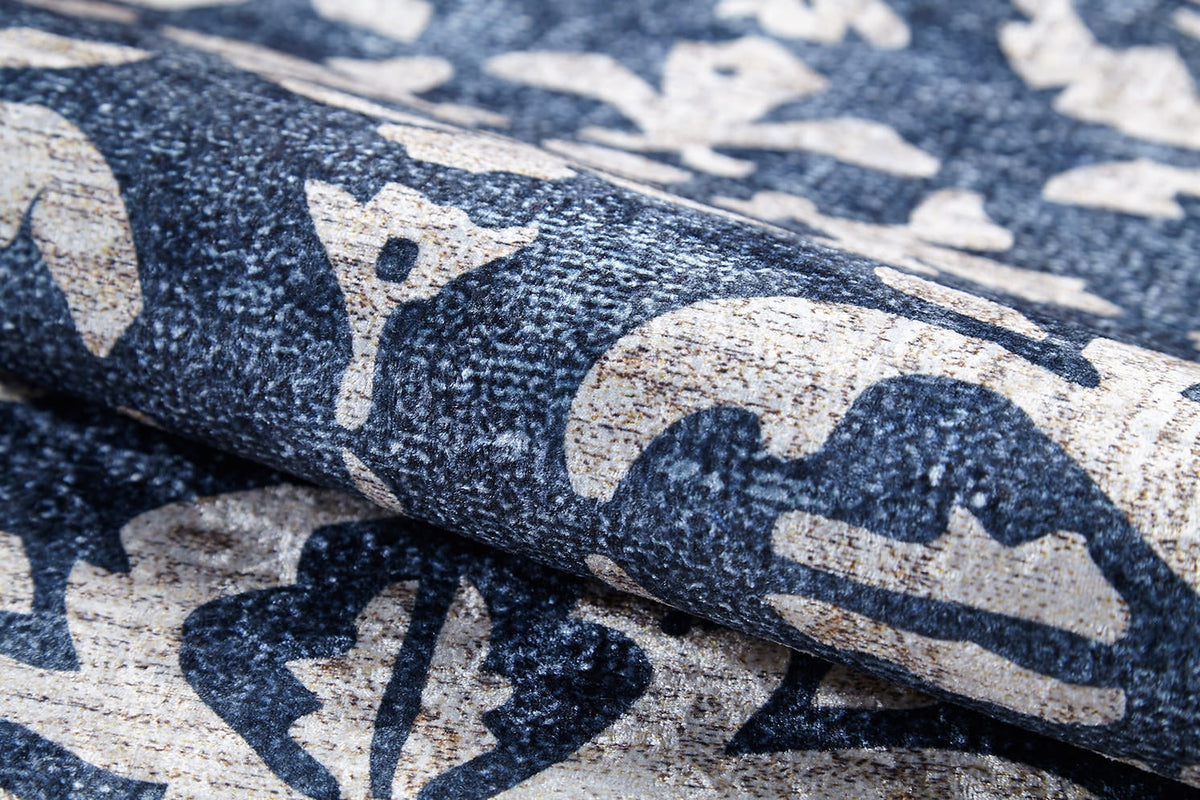 A close-up of the Antique Flourish - Washable Rug - JR1591 (Custom Size) in dark blue and beige, showcasing its floral and abstract patterns, texture, and weave—perfect for high-traffic areas needing washable rugs.
