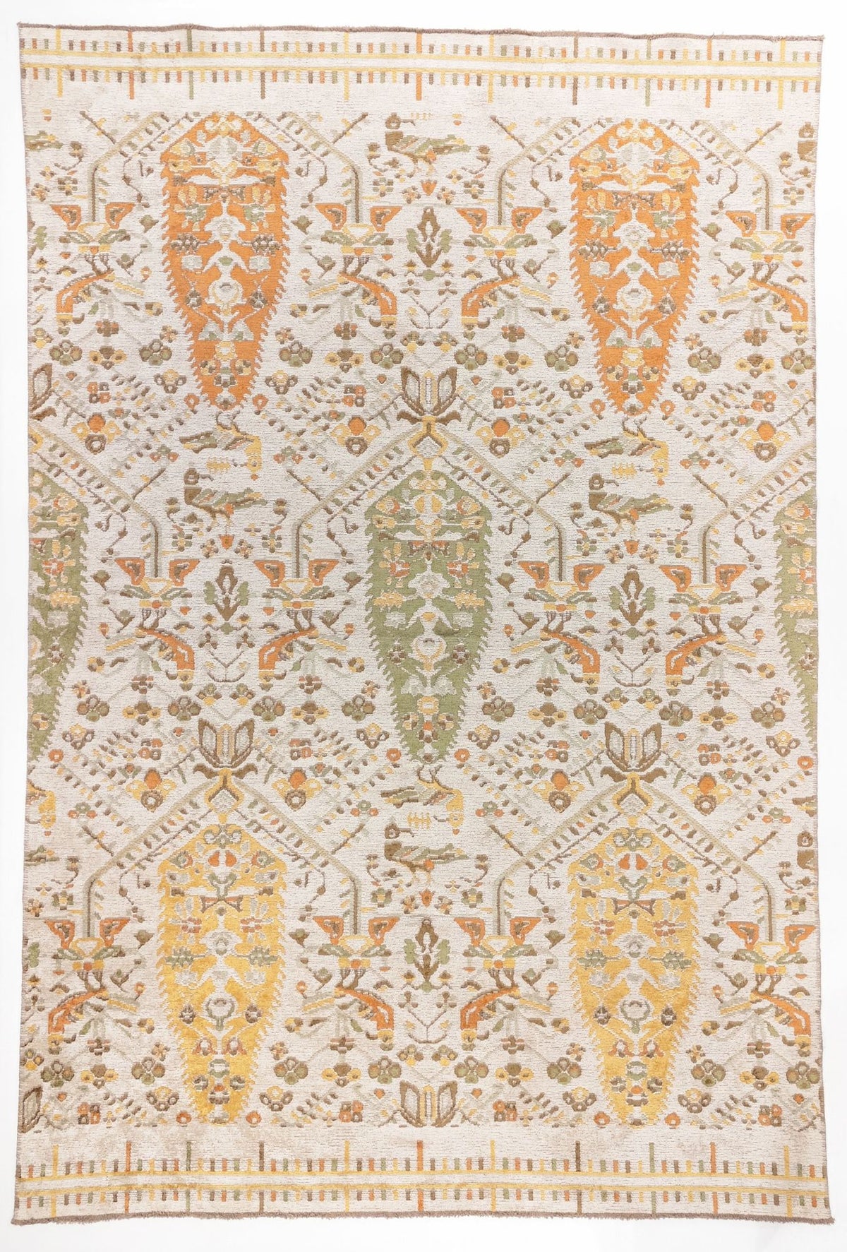 
Saffron Heritage area rug with cream ground and orange, gold, and sage green paisley boteh motifs