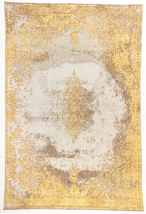 Load image 1 in gallery view. Golden Fade area rug with vintage yellow and cream palette, heavily distressed medallion, warm taupe accents