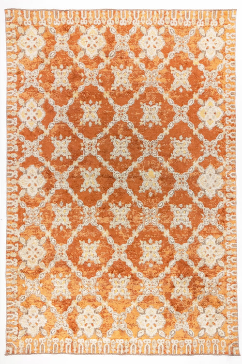 Load image 1 in gallery view. Amber Trellis area rug with burnt orange field and ivory lattice pattern featuring distressed floral motifs