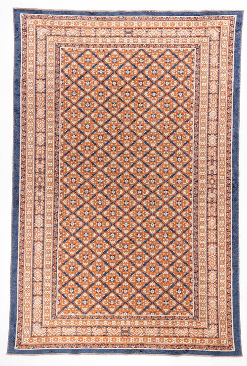 Load image 1 in gallery view. Spice Lattice area rug with rust orange field, cream diamond lattice pattern, and navy blue triple border