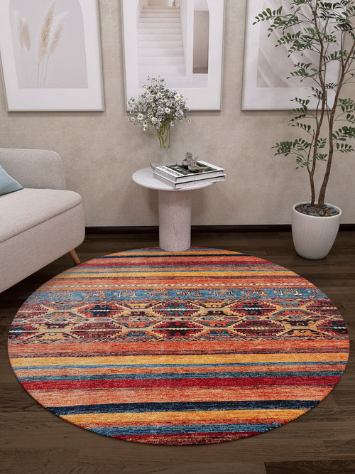 Load image 1 in gallery view. The Arctic Chill - Washable Rug - JR860 (Custom Size) adds vibrant stripes and color, brightening dark wood floors beside a light sofa, side table with flowers, potted plant, and framed art—ideal for high-traffic areas.