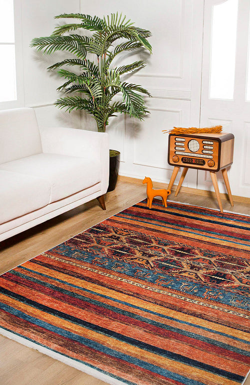Load image 1 in gallery view. A cozy living room features the Arctic Chill - Washable Rug - JR860 (Custom Size), ideal for high-traffic areas, along with a white sofa, potted plant, orange decorative horse, vintage radio on a wooden stand, and bright natural light.