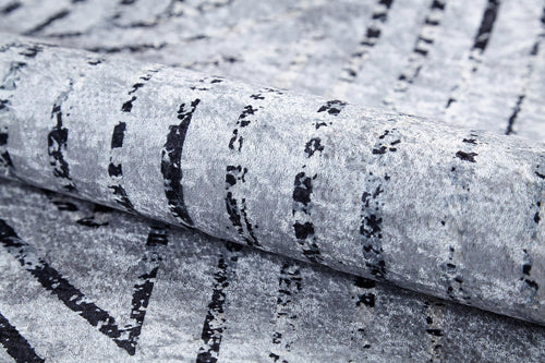 Load image 1 in gallery view. A close-up of the Art Deco Empress - Washable Rug - JR1867 (Custom Size) shows its gray-anthracite tones, irregular black lines, and abstract geometric patterns that create a modern, artistic look.