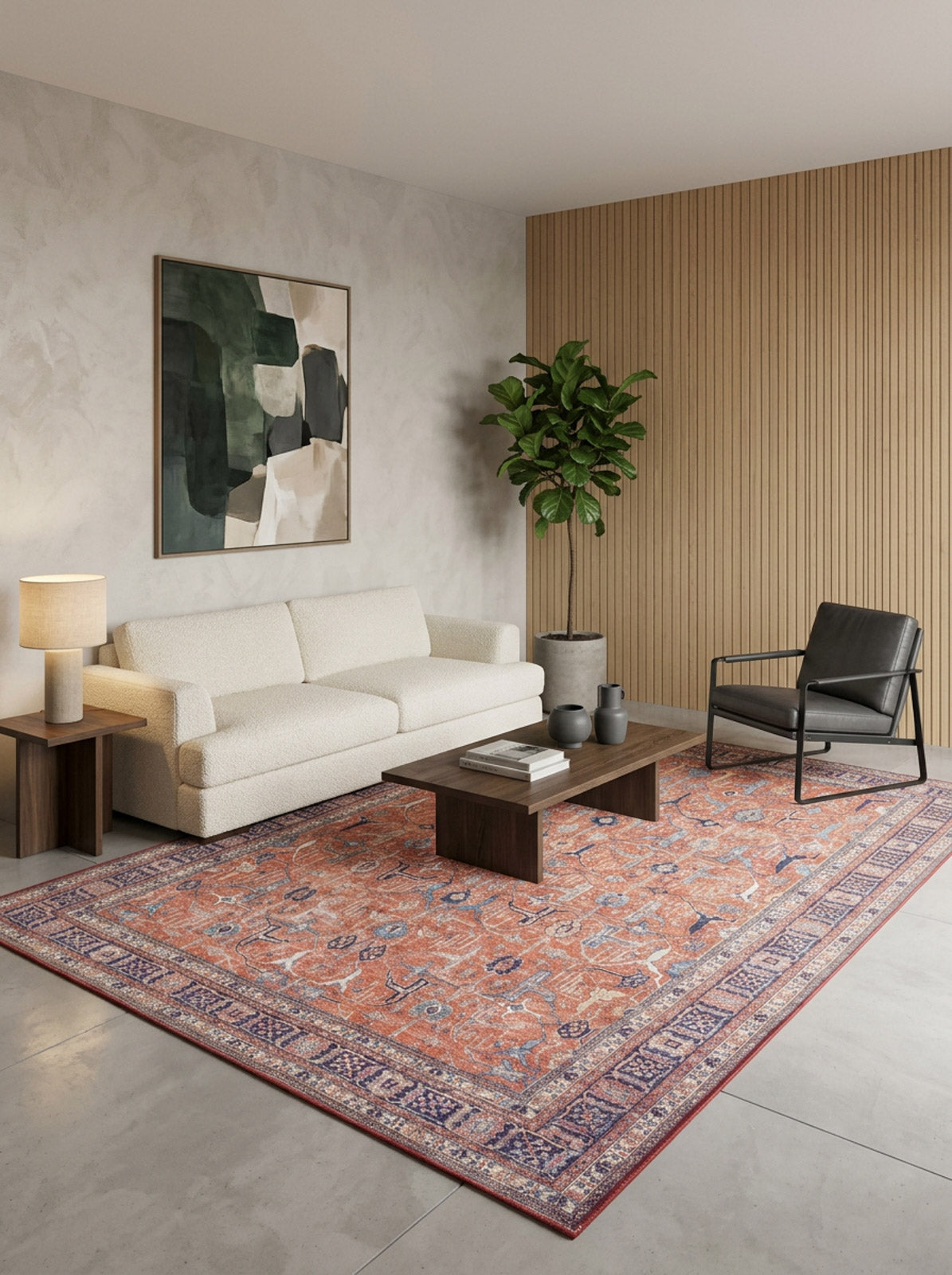 Terracotta and blue traditional Persian-style rug with a distressed floral pattern, styled in a modern living room.