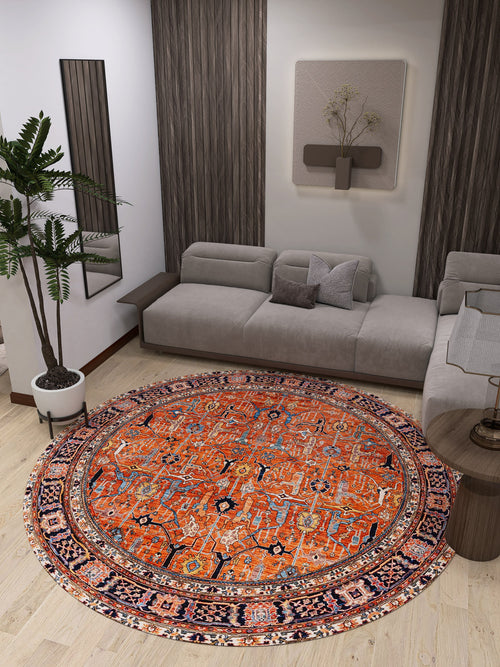 Load image 1 in gallery view. A modern living room with the Aurelius Coral Washable Rug - LCC3005, a light gray sectional, potted plant, wall art, mirrors, and wood accents—perfect for adding style and comfort to high-traffic spaces.