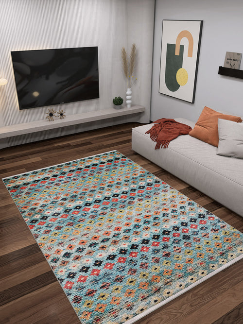 Load image 1 in gallery view. A modern living room with a wall-mounted TV, contemporary art, a beige sectional sofa with gray and rust pillows, and the Aztec Ambience - Washable Rug - JR1086 (Custom Size) for high-traffic areas on dark wood floors.