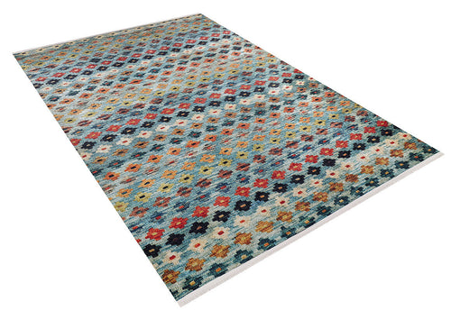Load image 1 in gallery view. The Aztec Ambience - Washable Rug - JR1086 (Custom Size) features vibrant rows of small diamond and floral motifs in blue, red, yellow, orange, and white—perfect for brightening high-traffic areas.