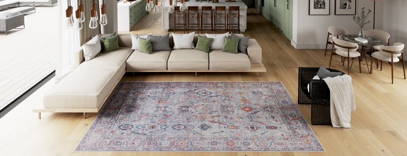 Modern open-plan living room and kitchen featuring a large beige sectional sofa, wooden flooring, dining area, and the Bellaris Gray Washable Rug - LCC3003 (Custom Size); stylish neutral decor for a fresh contemporary vibe.