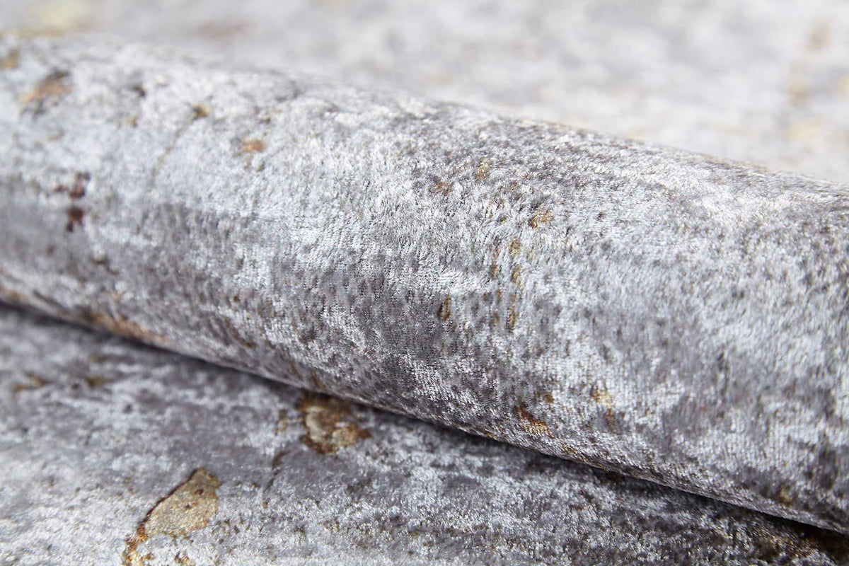 A close-up of Berry Blossom - Washable Rug - JR1818 (Custom Size), featuring textured silver-gray fabric with a metallic sheen and hints of brown and beige, perfect for a sophisticated gray-anthracite or stylish flat weave rug.