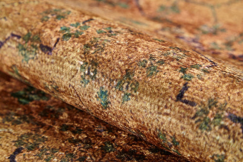 Load image 1 in gallery view. A close-up of the Blossom Breeze - Washable Rug - JR1752 (Custom Size) reveals its textured brown and gold surface with hints of green and purple, a soft feel, and a vintage look—perfect for high-traffic areas.