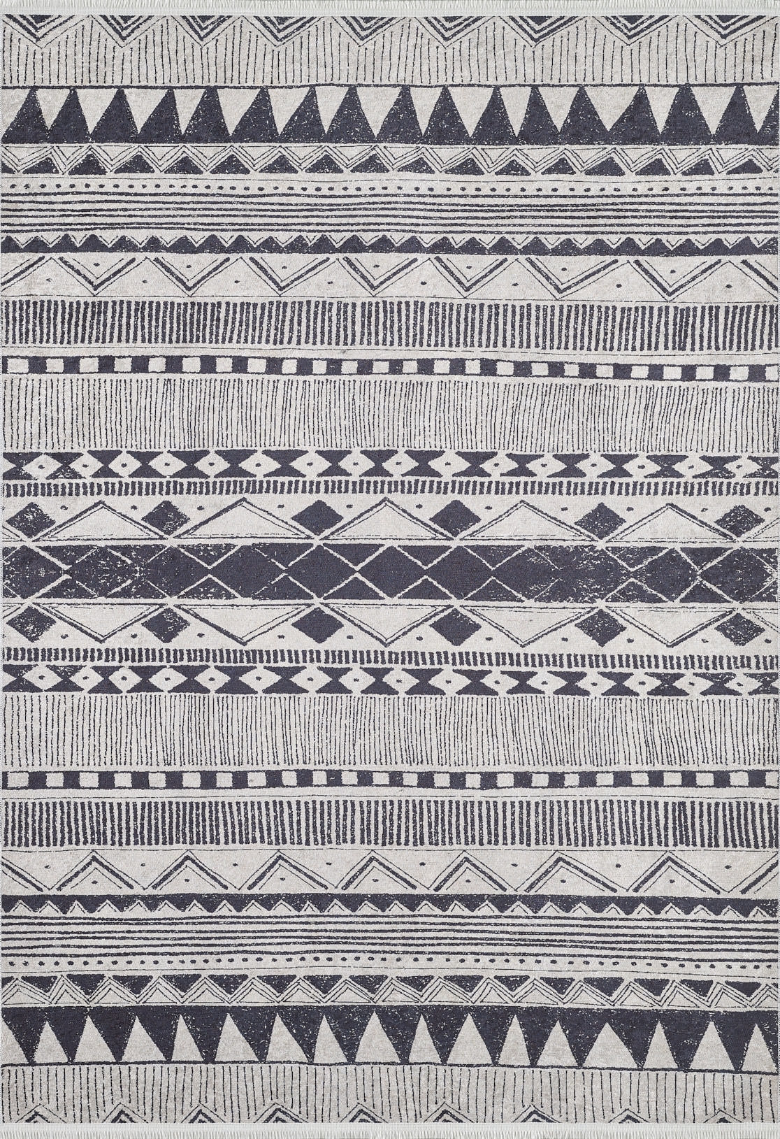 The Bohemian Sunrise - Washable Rug - JR1713 (Custom Size) is a rectangular gray-anthracite rug with black and white geometric patterns, including triangles and diamonds. Its symmetrical design is ideal for high-traffic areas.