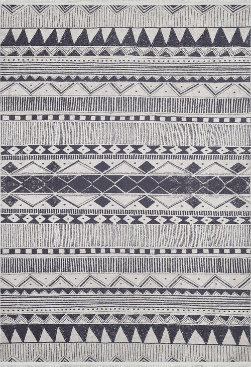 Load image 1 in gallery view. The Bohemian Sunrise - Washable Rug - JR1713 (Custom Size) is a rectangular gray-anthracite rug with black and white geometric patterns, including triangles and diamonds. Its symmetrical design is ideal for high-traffic areas.