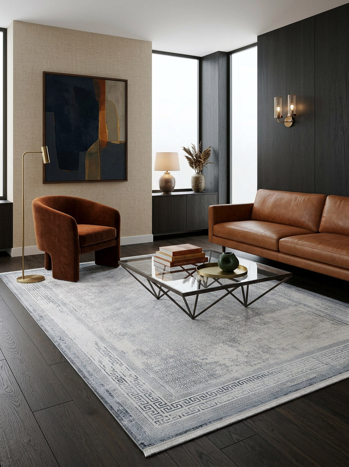 Light grey and blue distressed rug with a Greek key border, styled in a modern living room.