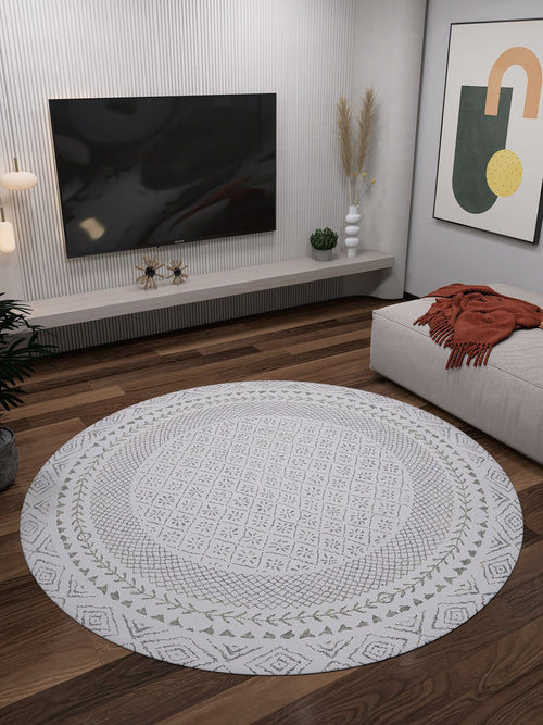 Load image 1 in gallery view. A modern living room featuring the Borderline Brilliance - Washable Rug - JR1987 (Custom Size) in gray-anthracite, ideal for high-traffic areas, with wooden floors, a wall-mounted TV, minimalist decor, and abstract wall art.