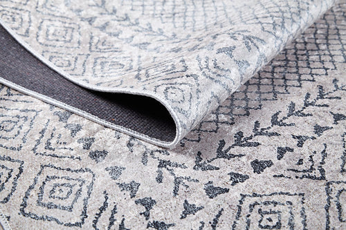 Load image 1 in gallery view. A close-up of the Borderline Brilliance - Washable Rug - JR1987 (Custom Size) in gray-anthracite, featuring geometric and diamond patterns with a dark backing—perfect for high-traffic areas.